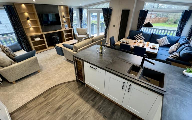 Lounge, Kitchen & Dining area in a Luxury Lodge