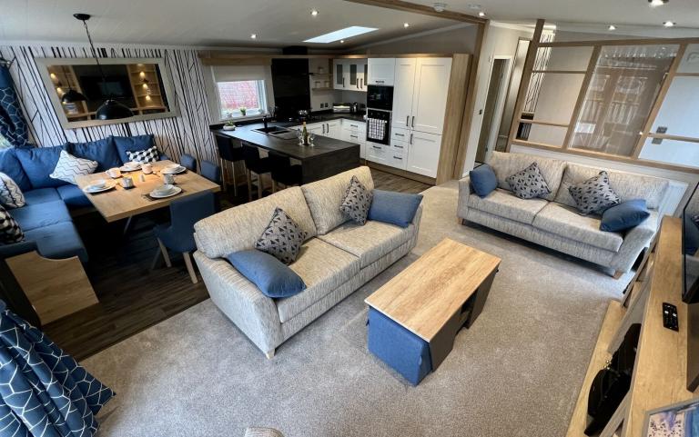 Lounge, Kitchen & Dining area in a Luxury Lodge
